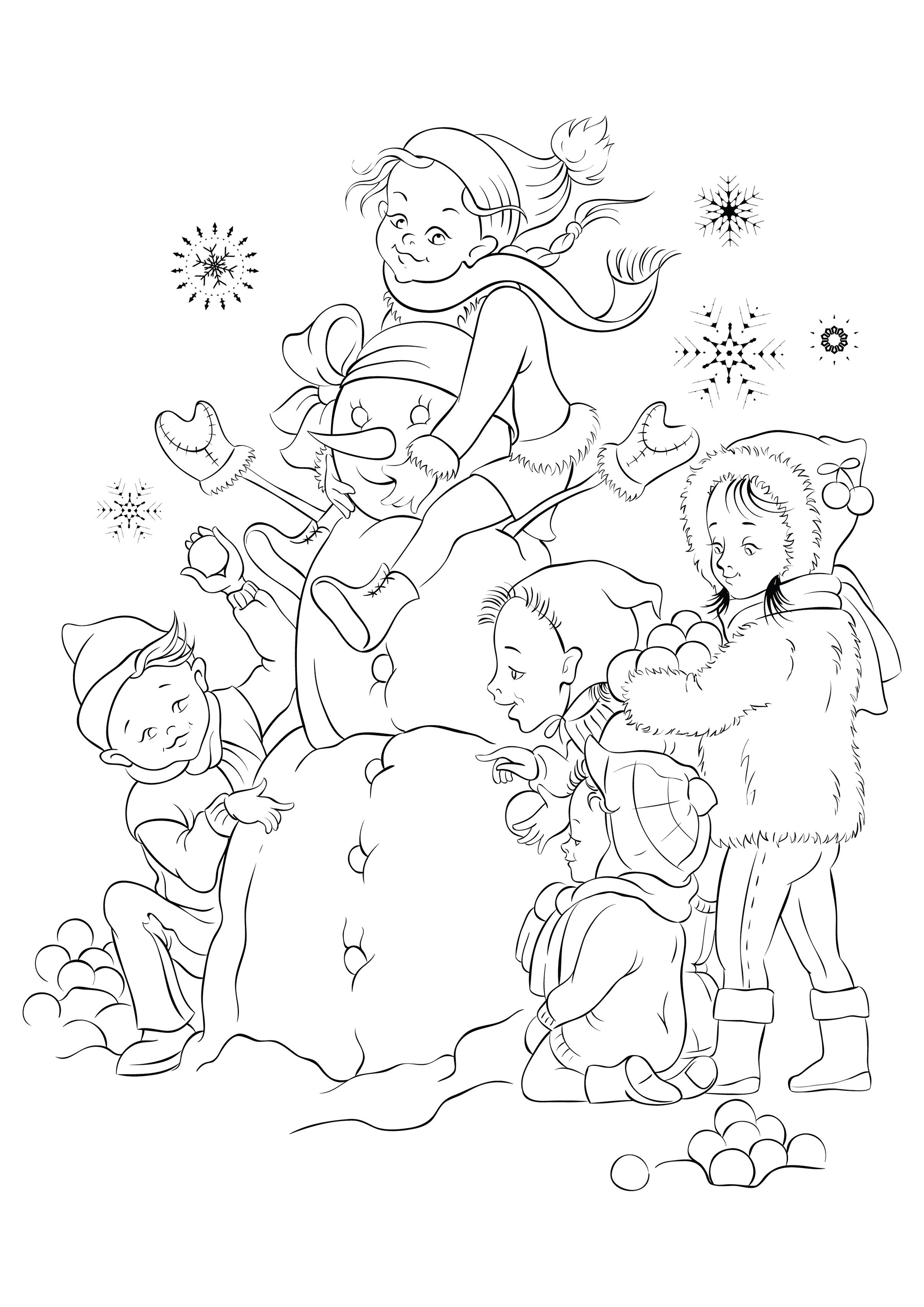 Crianças felizes a fazer um boneco de neve