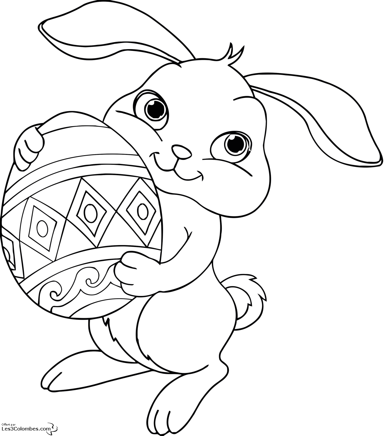 Un lapin en train de peindre des oeufs pour Pâques