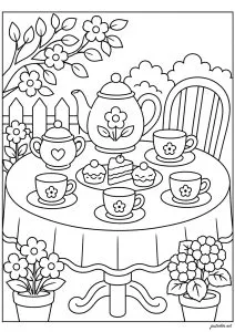 Table with teapot and cups in the garden