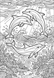 Three dolphins in the ocean. Three elegant dolphins move in an aquatic dance, surrounded by waves, bubbles, and sunbeams piercing the water. A seabed of corals, algae, and shells enriches this refined oceanic scene.