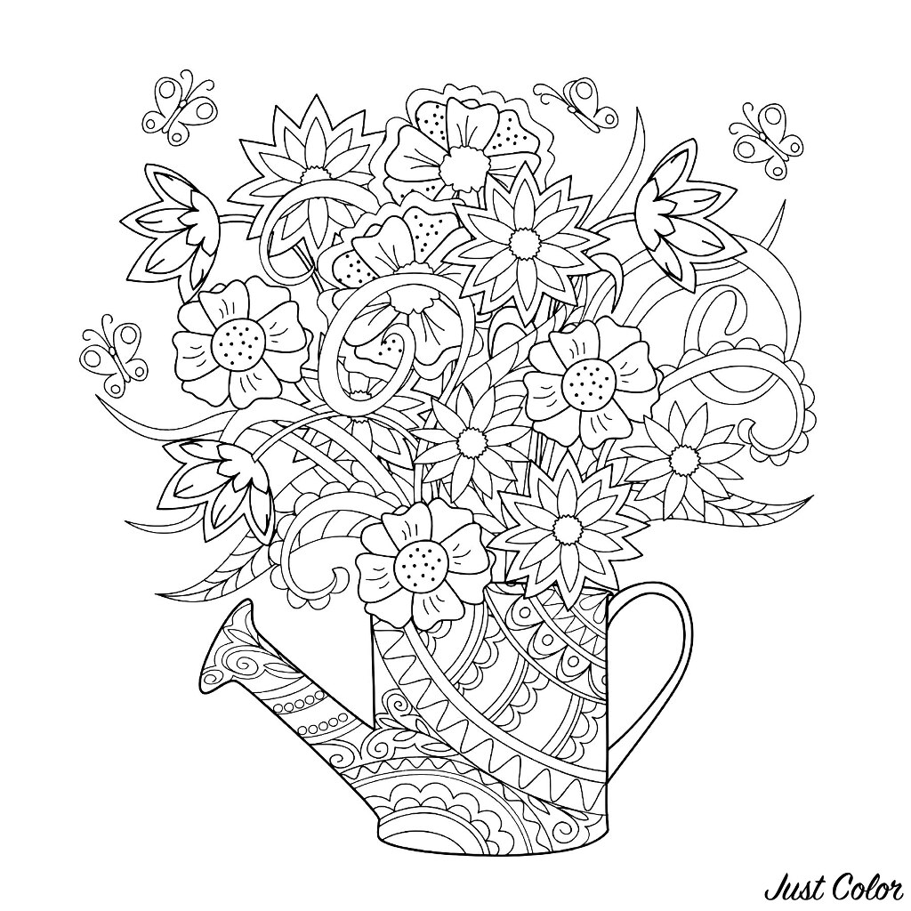 Elegant Watering can with flowers inside