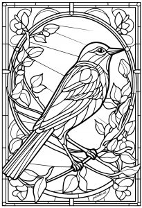 Beautiful bird and flowers in a stained glass window