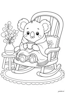 Koala douillet avec tasse chaude