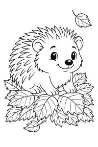 Petit hérisson sur des feuilles mortes