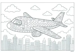 Avion survolant une ville remplie de gratte ciels
