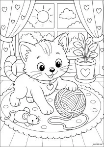 Playful kitten near a sunny window