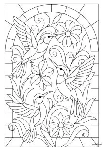 Vol gracieux des colibris entourés de fleurs