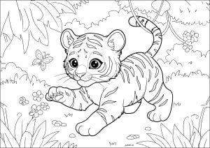 Joven tigre jugando con una mariposa