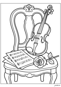Violín en una silla con partitura