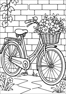Bicicleta apoyada contra una pared de ladrillo